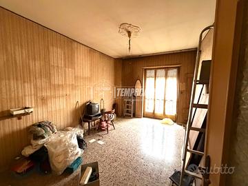 AMPIO QUADRILOCALE LUMINOSO