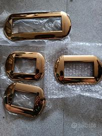 placchette arancione e oro  living light