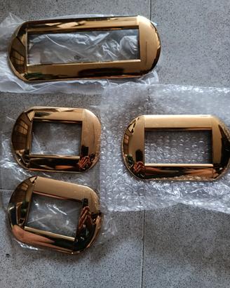 placchette arancione e oro  living light