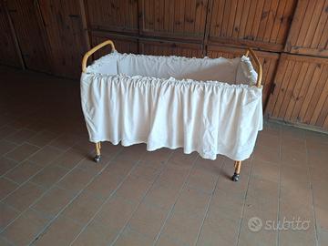 Culla in vimini con ruote
