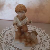 Vecchia statua bambino  in porcellana Capodimonte.