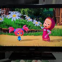 TV Samsung con impianto stereo Sony  con tavolino