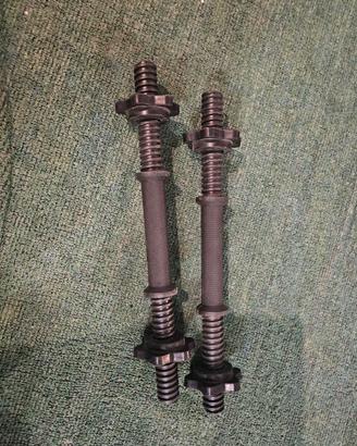 Manubri in plastica regolabili e con ferma dischi