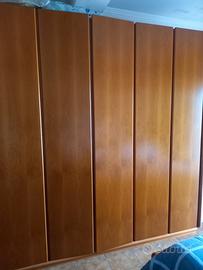 camera da letto in puro legno noce