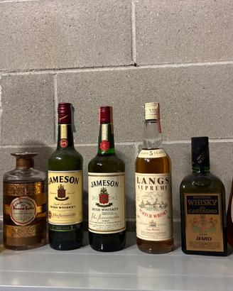 Lotto bottiglie di 31 tra whisky e whiskey