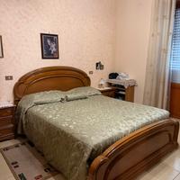 Letto matrimoniale in legno massello