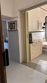 Appartamento con posti auto nel garage centro