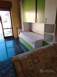 cameretta a ponte parete attrezzata