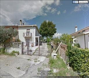 Casa con terreno edificabile