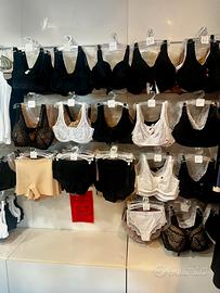 Pareti attrezzate modulabili per negozio