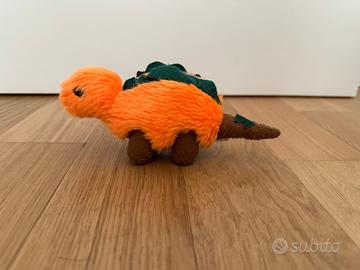 Peluche arancione dinosauro