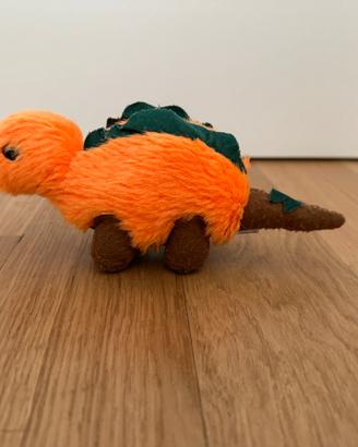 Peluche arancione dinosauro