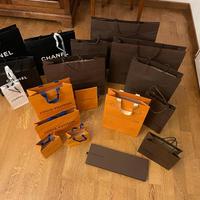Borse in carta di marca Louis Vuitton e Chanel