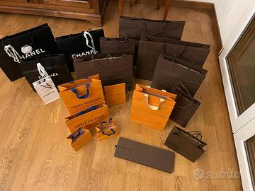 Borse in carta di marca Louis Vuitton e Chanel