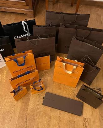 Borse in carta di marca Louis Vuitton e Chanel