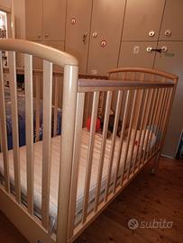 lettino bimbo  con sponda regolabile e cassetto