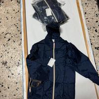 Stock di Kway antipioggia trasformabile