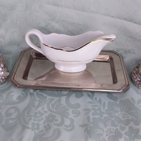 Salsiera con cucchiaio e papere argentate