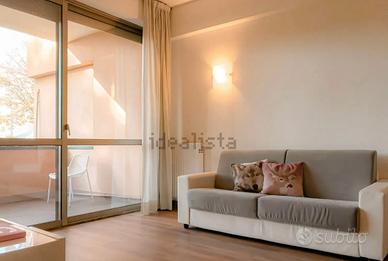 Aurelia trilocale con giardino e p.auto