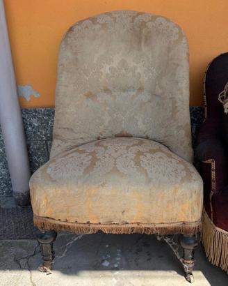 Poltrona vintage in tessuto con rotelle