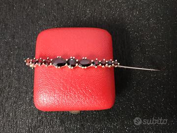 Spilla Vintage argento 835/1000 con pietre granato