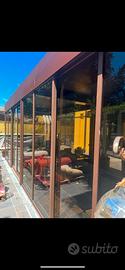 Pergola bioclimatica con vetrate scorrevoli