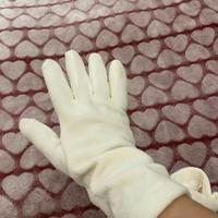 Guanti panna con motivo arricciato