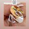 anello-vortice-in-oro-bianco-e-giallo