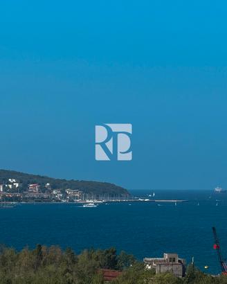 Appartamento con giardino, cantina e posto auto