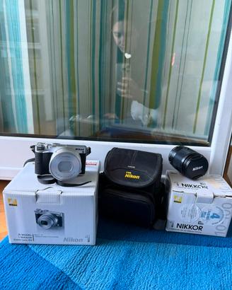 Macchina fotografica Nikon J5 + obiettivo Nikkon