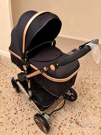 Passeggino trio neonato oro nero