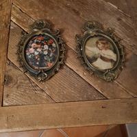 Coppia di cornici FF  ovali in bronzo