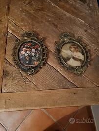 Coppia di cornici FF  ovali in bronzo