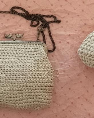 Borsetta (pochette) con catenellae portamonete.