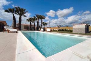 Sulla SPIAGGIA tra Cava D'Aliga e Donnalucata