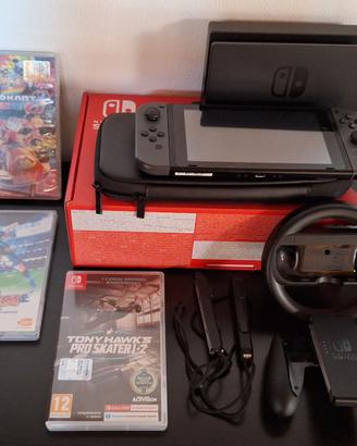 Nintendo switch con accessori e giochi