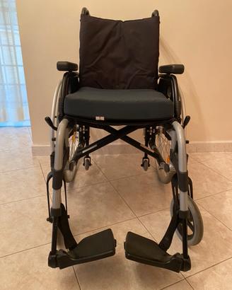 Sedia a rotelle BREEZY BASIX2 pieghevole + cuscino