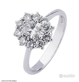 ANELLO IN ORO 18kt. CON DIAMANTI E DIAMANTE OVALE