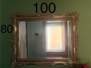 Specchio con cornice barocca dprata intagliata