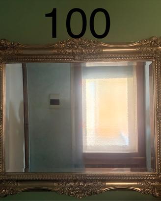Specchio con cornice barocca dprata intagliata