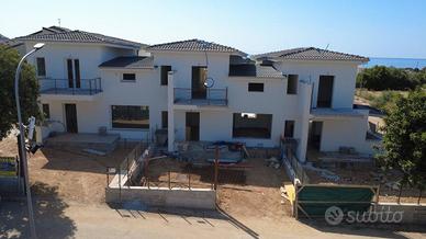 Porz di trifamiliare vista mare