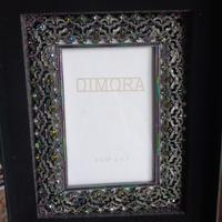 Cornice con pietre semi preziose