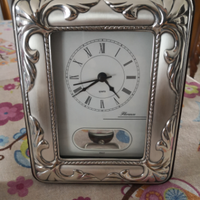 Orologio pendolo bordo argento