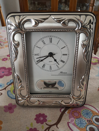 Orologio pendolo bordo argento