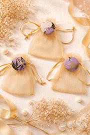 sacchetti bomboniera con bottone gioiello 