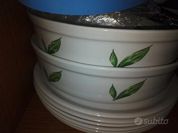 Pirofile in ceramica e grandi piatti tipo pizza 