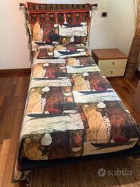 Letto singolo, libreria, scrivania e comodino