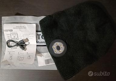 Cappello con torcia + auricolari bluetooth