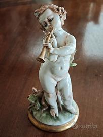 Statua Capodimonte bambino con flauto