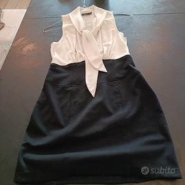 Elegante tubino bicolore smanicato con fiocco